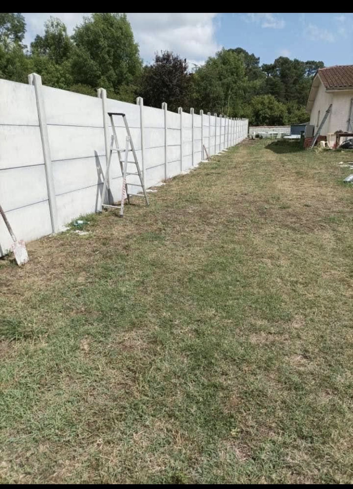 Pose de clôture après travaux